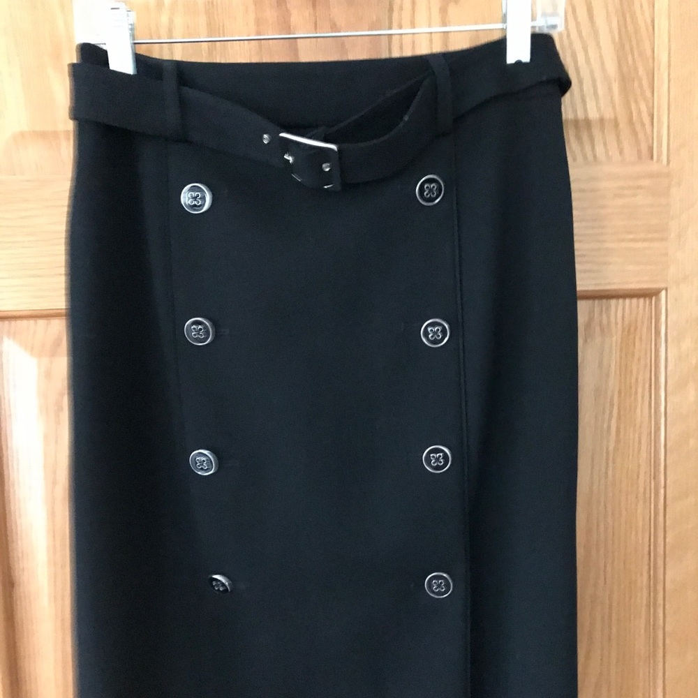 A lone skirt with buckled belt and two rows of decorative buttons by WHBM